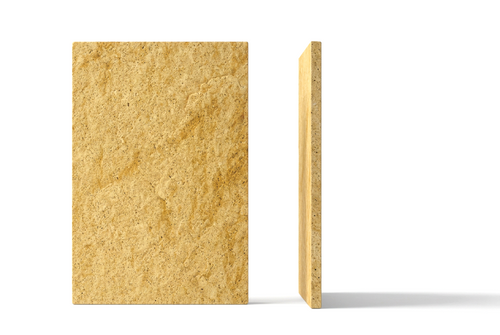 Canteras Naturales Santo Tomás Cantera Oro stone tile with a warm golden ochre texture and rustic artisanal finish.