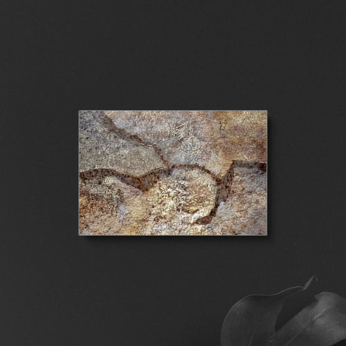 Canteras Naturales Santo Tomás natural stone tile with rustic archaeological finish and textured earthy tones.