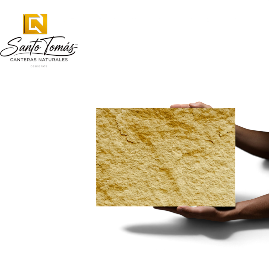 Canteras Naturales Santo Tomás Cantera Oro stone tile with a warm golden ochre hue and a rough, wavy artisanal texture