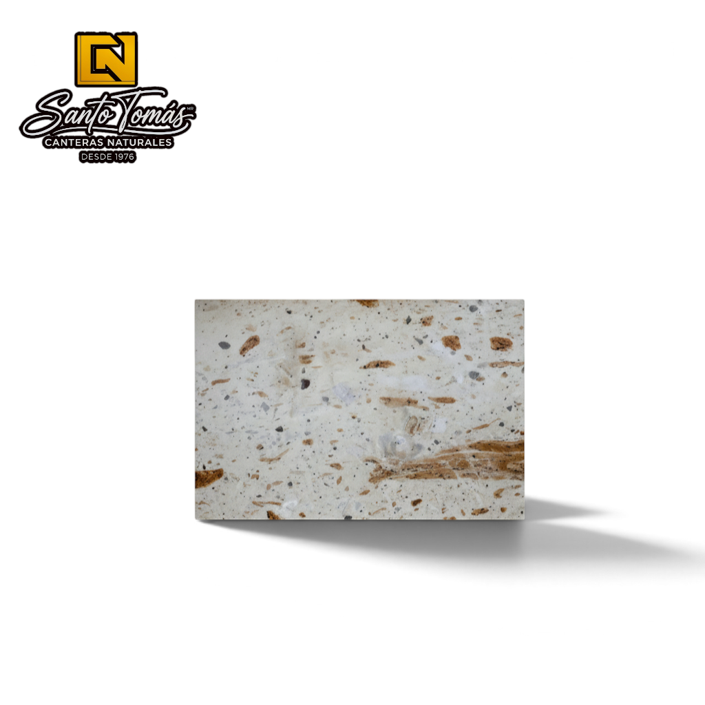 Canteras Naturales Santo Tomás Cantera Piñón stone tile with cream base and reddish-brown speckled texture.