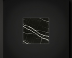 Canteras Naturales Santo Tomás Negro Monterrey marble tile with a polished finish, deep black stone and white veins.