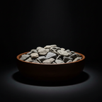 Piedra bola diamantina decorativa gris en tazón de madera, ideal para paisajismo y diseño de jardines.